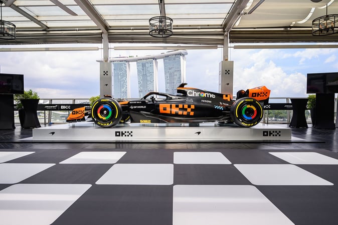 OKX Eyes 10-Year Deals with McLaren and Man City, Unveils ‘Stealth Mode’ Race Car