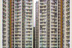 Hong Kong Property Stocks Soar to Boost Hang Seng’s Dominance